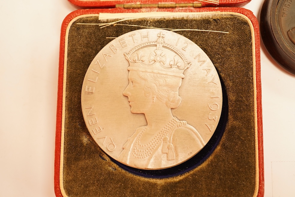 British Medals, to include George VI Matt Silver Coronation medal, cased, George V silver jubilee medal, boxed, Uppingham School silver medal for good work and unblemished character, cased and various coins etc.